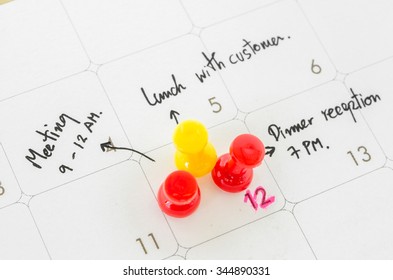 Pushpin On Calendar With Busy Day Overworked Schedule.