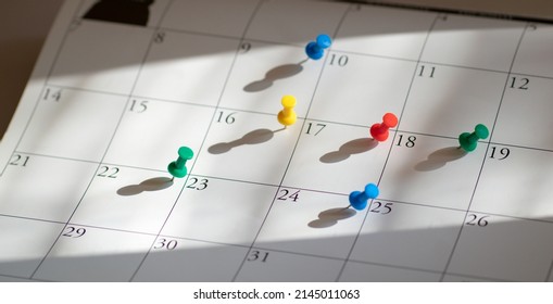 Pushpins Or Thumbtacks On Calendar. Busy, Full Schedule Of Appointment And Meeting Concept.