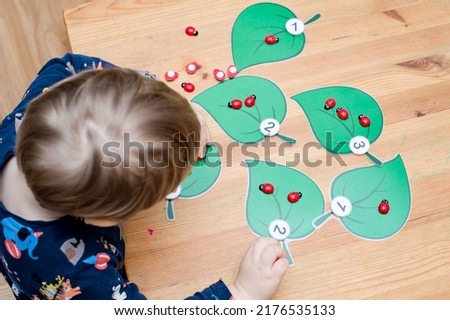 put correct amount of ladybird on assigned tree leaf. baby playing counting game. preschool educational aid for kindergartens. children early learning montessori kit for intelligence and development