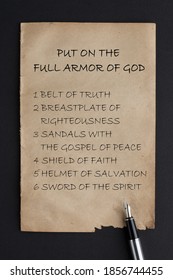 Put on the full armor of God written on old paper with fountain pen.