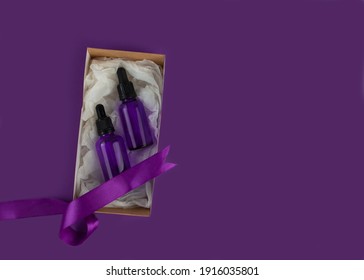 Put A Purple Ribbon In My Order. Code Words When Calling From Victims Of Domestic Violence. The Purple Ribbon Is International Symbol Of Violence. Serum Glass Bottle In Craft Box With Purple Ribbons.