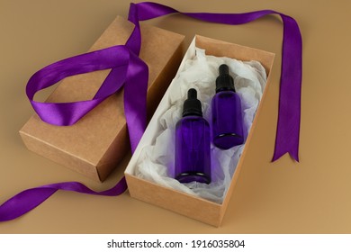 Put A Purple Ribbon In My Order. Code Words When Calling From Victims Of Domestic Violence. The Purple Ribbon Is International Symbol Of Violence. Serum Glass Bottle In Craft Box With Purple Ribbons.