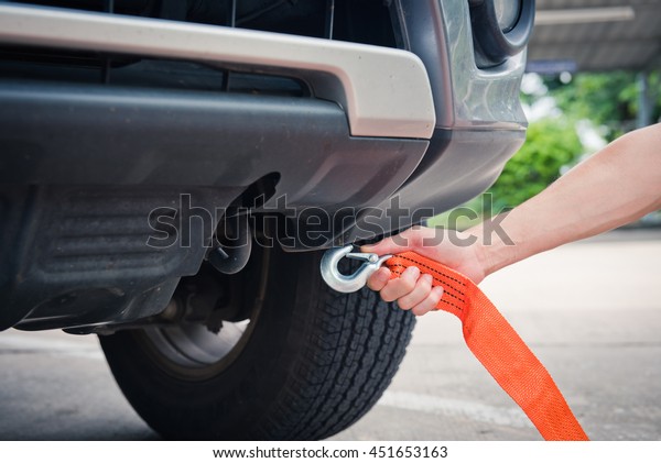 Put towing car
with towing rope,webbing sling
