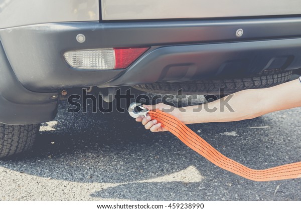 Put towing car\
with towing rope,webbing sling\
