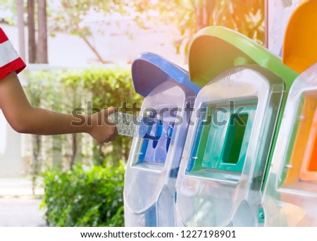 Put trash in trash by the classification of garbage. environmental safe concept