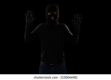 Put Your Hands Up. Scared Criminal With A Black Mask Getting Caught By The Police During A Robbery 