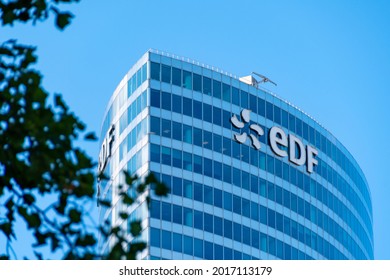 Puteaux, France - July 29, 2021: Exterior view of the top of the EDF tower in the financial district of Paris-La Defense. EDF (Electricité de France) is the historical supplier of French electricity
