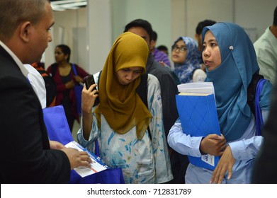 Putra World Trade Centre, Kuala Lumpur, Malaysia. - FEBRUARY 21TH 2017. Teens Of All Ages Attending Annual Education Fair To Choose A Career Path And Receive Vocational Counseling.