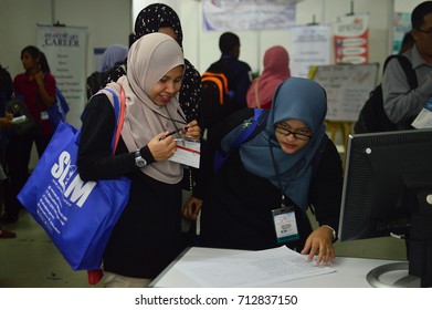 Putra World Trade Centre, Kuala Lumpur, Malaysia. - FEBRUARY 21TH 2017. Teens Of All Ages Attending Annual Education Fair To Choose A Career Path And Receive Vocational Counseling.