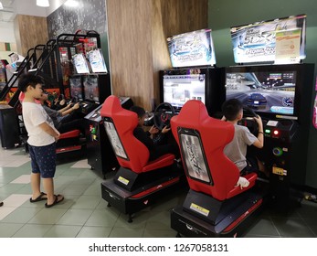 Putrajaya, Malaysia - 24 December 2018 : Closeup Video Game Car Racer Slot Machines For Kids Section In Shopping Mall.  