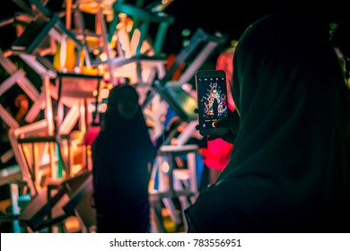 Putrajaya, Malaysia - December 2017 - Visitor Taking Pictures Of The Art Installation At Festival Light And Motion Putrajaya (LAMPU) 2017