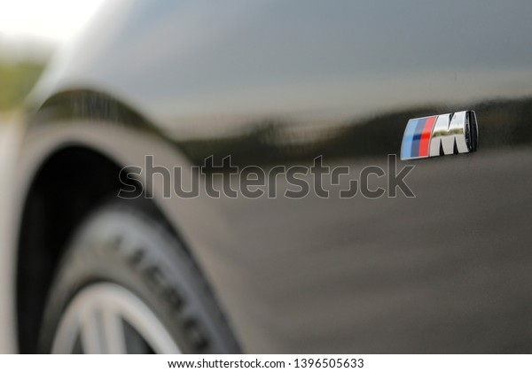 PUTRAJAYA, MALAYSIA - MAY 10, 2019. A close up\
of BMW M Power emblem at the BMW 630i GT car during test ride in\
Putrajaya, Malaysia.