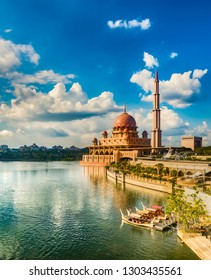  Putrajaya Skyline. Boats On The Foreground. Amazing View Of  Putra Mosque At Sunset