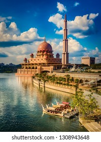  Putrajaya Skyline. Boats On The Foreground. Amazing View Of  Putra Mosque At Sunset