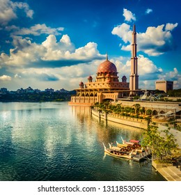  Putrajaya Skyline. Boats On The Foreground. Amazing View Of  Putra Mosque At Sunset