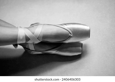 Putsants. Ballet shoes. Dance shoes. Photo of pointe shoes on the foot, black and white photo. - Powered by Shutterstock