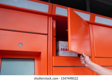 Putting box with fragile goods to self service postal case 