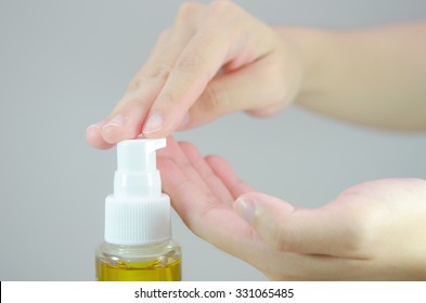 Putting Cleansing Oil On The Hand