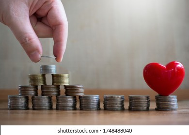 Putting Money Coin Saving For Concept Philanthropy ,donation And Finance Insurance