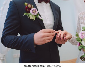 Putting On The Rings During Civil Marriage Registration Ceremony