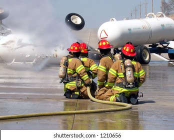 Putting On Water On Chemical Spill (contains Noise At Full Size)