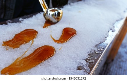 Putting Some Maple Syrup On Snow, Or Maple Toffee At The Sugar Shack.