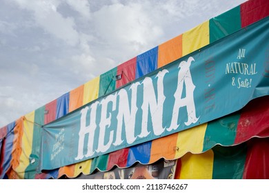 Puyallup, Washington, United States - 09-13-2021: A View Of A Henna Sign On The Side Of A Vendor Tent.