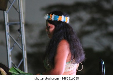 Puyo, Ecuador, 17-8-2019: Indigenous Woman Or Waorani Performing A Traditional Dance