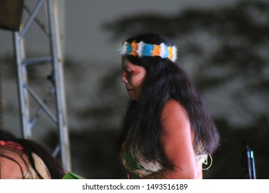 Puyo, Ecuador, 17-8-2019: Indigenous Woman Or Waorani Performing A Traditional Dance