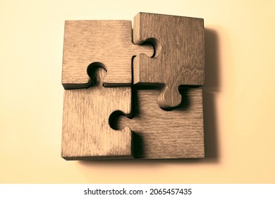 Puzzle of 4 four wooden pieces with copy space for text, isolated on white background. Brainstorming, teamwork, coworking and synergy  idea. 