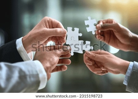 Puzzle, business hands and group of people for solution, teamwork and goals, integration or workflow success. Team building, games and development of person problem solving, synergy or collaboration