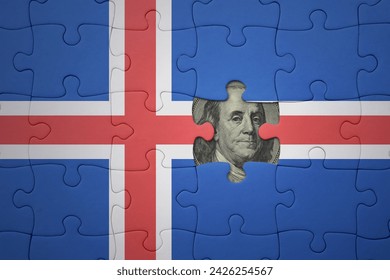 puzzle with the colourful national flag of iceland and usa dollar banknote. finance concept