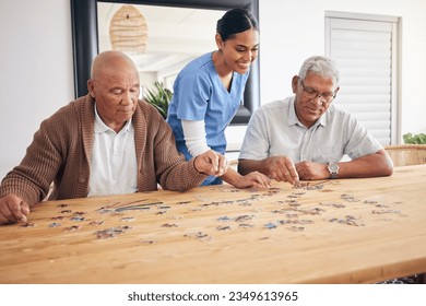 Puzzle game, caregiver and senior men playing for entertainment or bonding together in a retirement home. Happy, fun and elderly people enjoy mental rehabilitation and development with nurse - Powered by Shutterstock