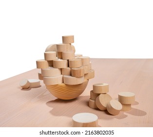 puzzle game. Construction of an unstable wooden block tower. The process of the game. Abstract concept of wooden toy 