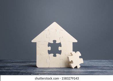 Puzzle House With A Missing Piece. The Acquisition Or Construction Comfortable Dream Home. Mortgage Loan Purchase Real Estate. Arrangement Premises Repair. Availability And Cheapness. Finish Building