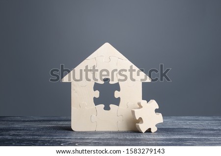 Puzzle house with a missing piece. The acquisition or construction comfortable dream home. Mortgage loan purchase real estate. Arrangement premises repair. Availability and cheapness. Finish building