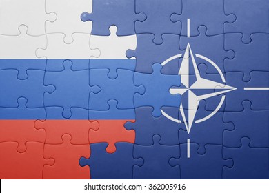 Puzzle With The National Flag Of Russia And Nato . Concept