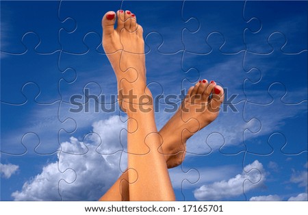 puzzle picture of female legs over blue sky with clouds