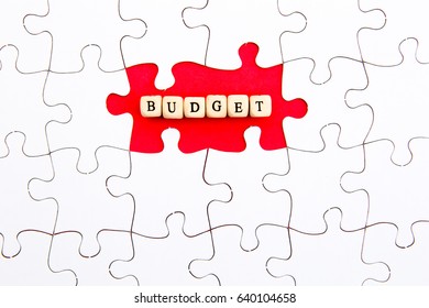Puzzle Pieces - with word Budget in missing red space
 - Shutterstock ID 640104658