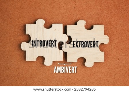 puzzle with the word Introvert plus Extrovert to become AMBIVERT. the concept of a person's personality