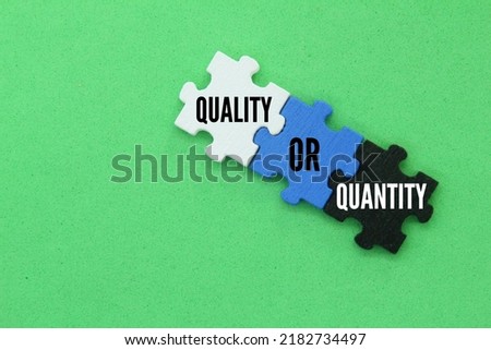 puzzle with the word Quality Or Quantity  the concept of quality  INDUSTRY Concept