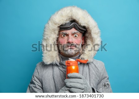 Similar – Image, Stock Photo Man covering himself with summer hat at countryside.