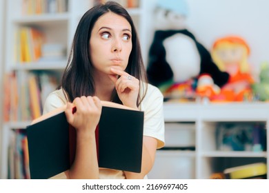 
Puzzled Mom Reading A Book On Parenting. Clueless Woman Feeling Confused Trying To Find Some Answers
