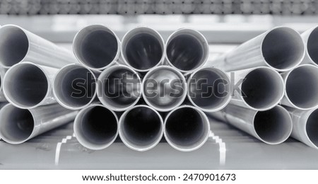 Similar – Image, Stock Photo Pipes on a house wall with vegetation form several right angles
