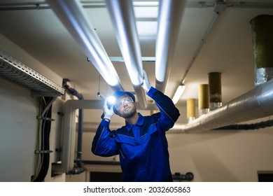 PVC Water Pipe Inspection By Construction Worker - Powered by Shutterstock