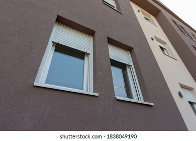 PVC windows with roller shutters and insect screen 