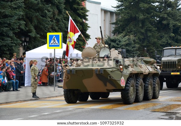 Pyatigorsk, Russia - May 9, 2018: BTR-80\
(GAZ-5903) Legendary wheeled amphibious armoured personnel carrier\
at the military parade. Has a National Guard of Russia Emblem\
onboard. Victory Day in\
Russia