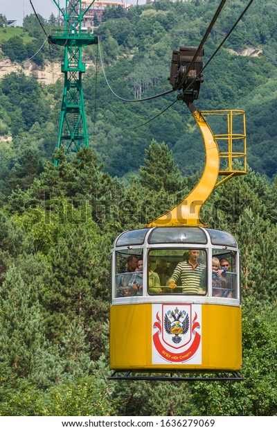 Pyatigorsk. Russian Federation, Pyatigorsk -\
06 Jul 2017; People ride in the cab of the cable car. Happy people\
on an excursion to a high mountain.\
