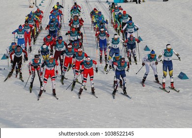 PYEONGCHANG, SOUTH KOREA - FEBRUARY 10, 2018: Mass Start In The Ladies' 7.5km + 7.5km Skiathlon At The 2018 Winter Olympics In Alpensia Cross Country Centre