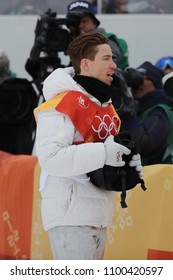 PYEONGCHANG, SOUTH KOREA - FEBRUARY 14, 2018: Olympic Champion Shaun White Of The United States Competes In The Men's Snowboard Halfpipe Final At The 2018 Winter Olympics In Phoeinix Snow Park